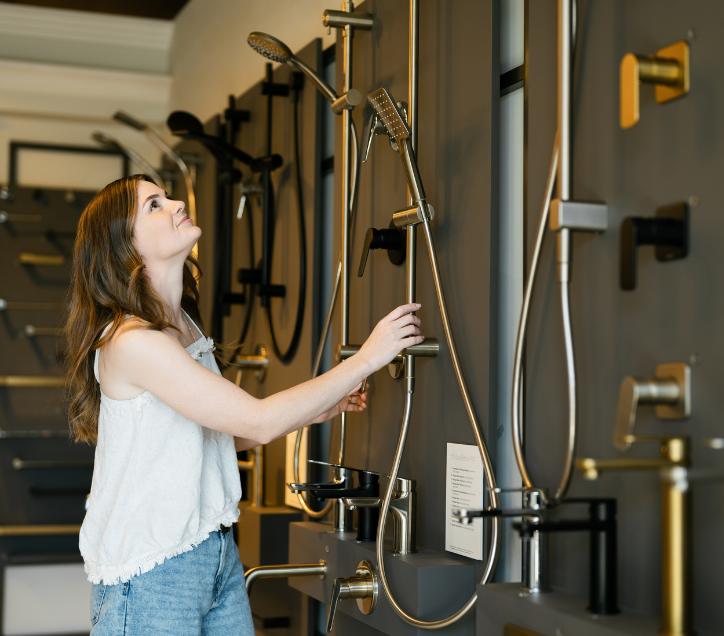 what inclusions do you get when you build, lady looking at shower options