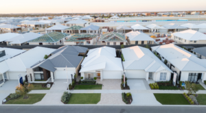 construction loan interest rates, drone shot of homes under construction